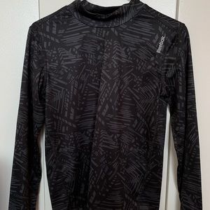 Reebok’s GRAPHIC LONG SLEEVE COMPRESSION SHIRT